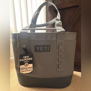 YETI Camino carryall bag. Gray in color. Brand new !! Beach days and leisure